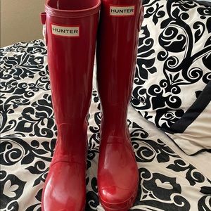 Shiny red Hunter rainboots
